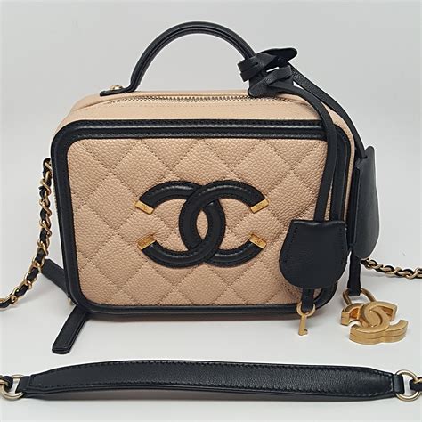 chanel filigree vanity case beige|chanel vanity bag vintage.